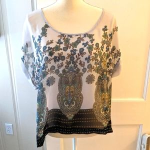 3/$15 fun short sleeve women's blouse with zip back. Size L